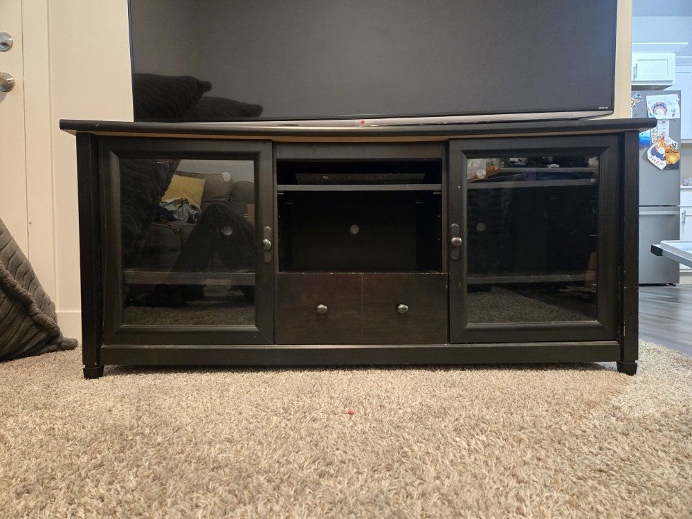FREE - Black Wood TV Stand Media Console with Glass Doors & Storage Drawer.