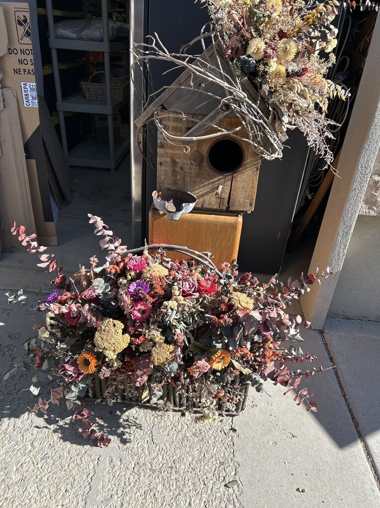 Bird House And Flowers