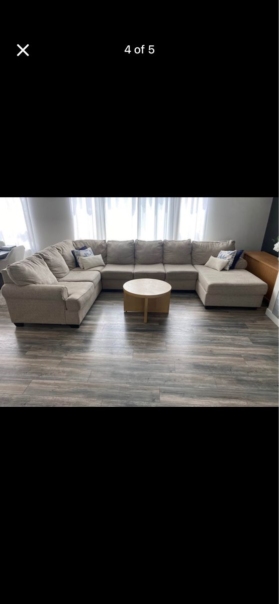 Large Beige U-Shaped Sectional Couch