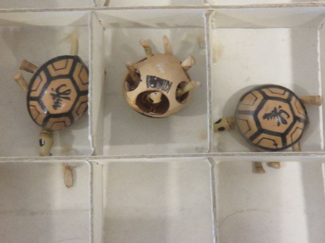 A SET OF THREE (3) VINTAGE SMALL HANDMADE TURTLES FROM GINKO NUT SHELLS MADE IN KOREA