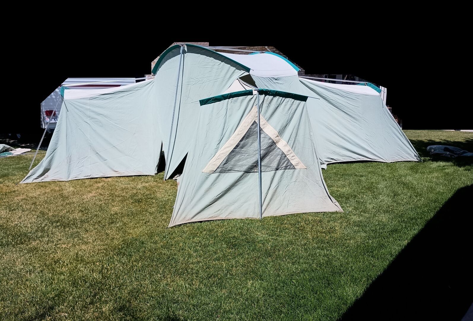 Springbar Leisure Port Tent with 3 matching zip-on bedroom modules.