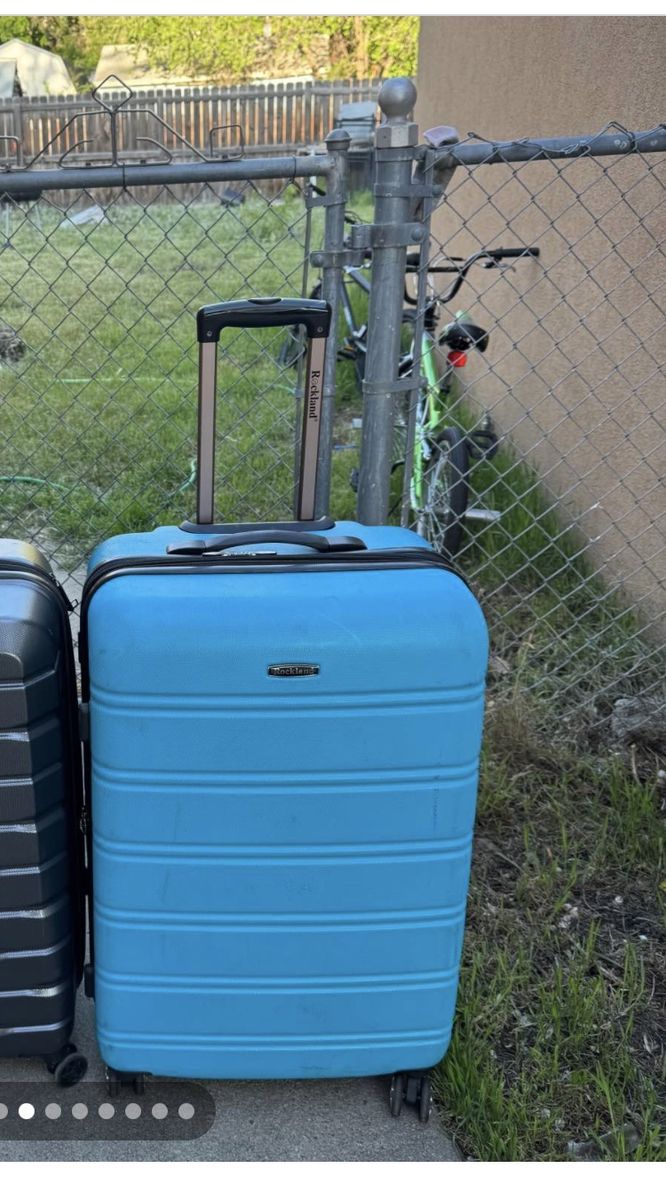 Rockland blue hard sheel luggage 29” Tall