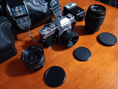 Ricoh Singlex II 35mm film SLR with Rikenon 1:2 f=50mm. lens / Rikenon 1:2.8 f=28mm. / Rikenon 1:2.8 f=135mm. Flash & Carring Ca