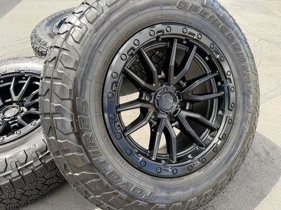 18" Fuel Rebel 6 Lug 6x5.5 33 Toyo AT3 265/70R18
