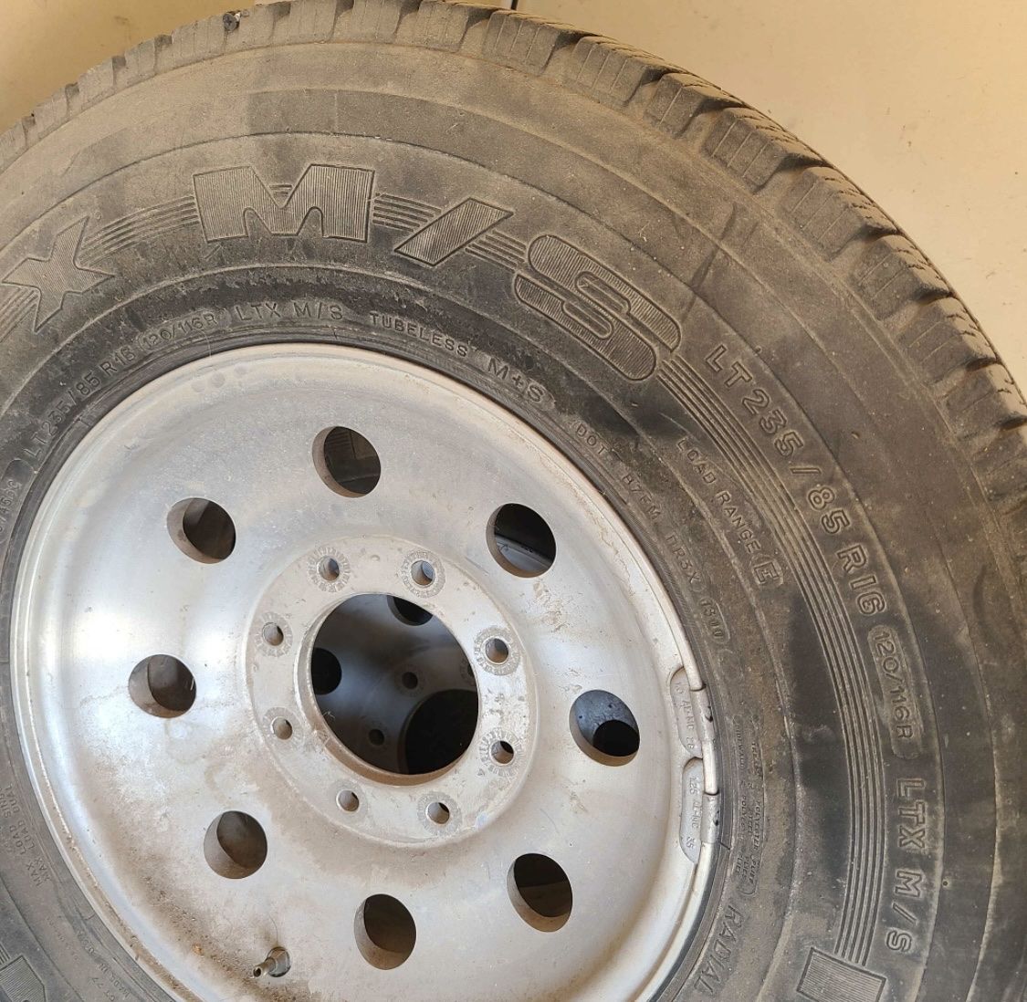 Michelin LT235/85R16 Load Range E M+S All-Season Truck Tire & Rim