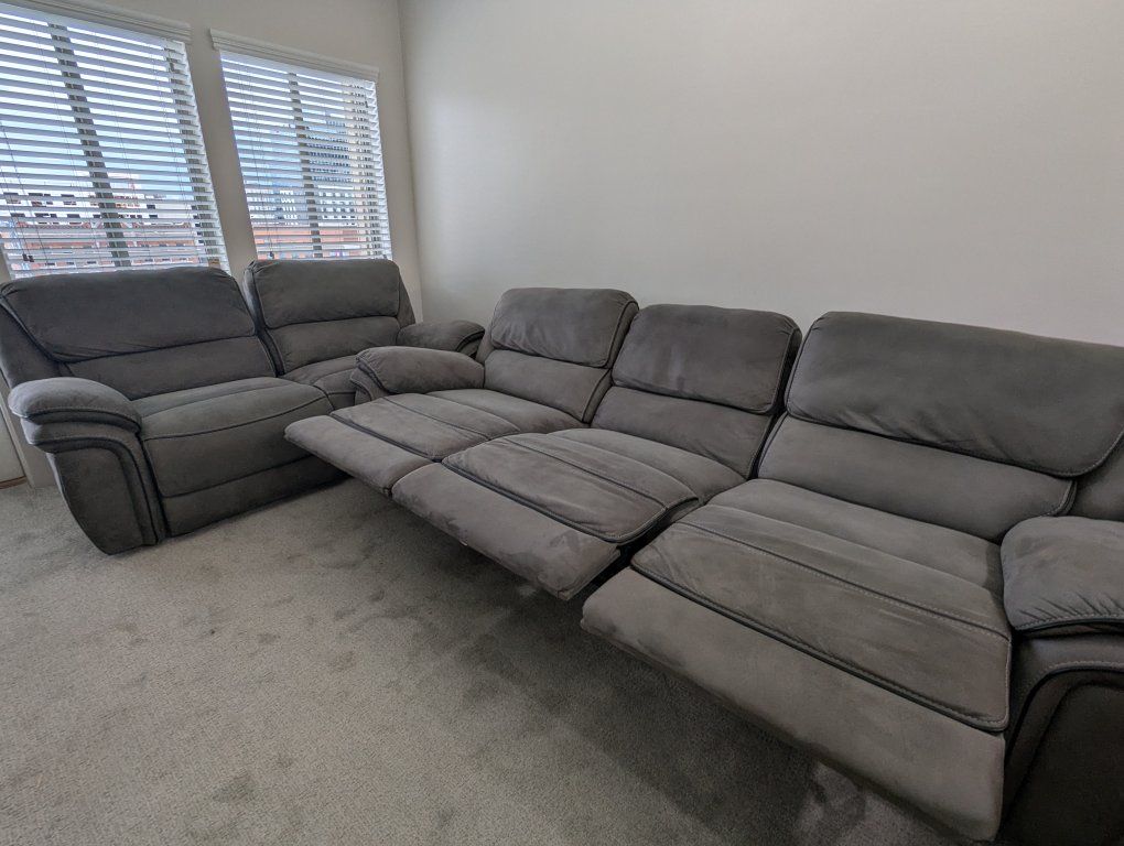 Grey Microfiber Reclining Sofa and Loveseat - each seat reclines and comes apart!