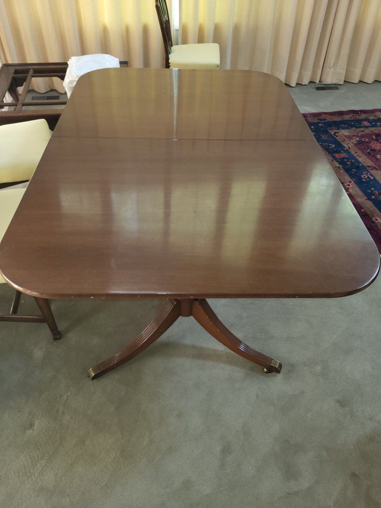 mahogany 7 ft dining table with 6 chairs plus 2 arms chairs