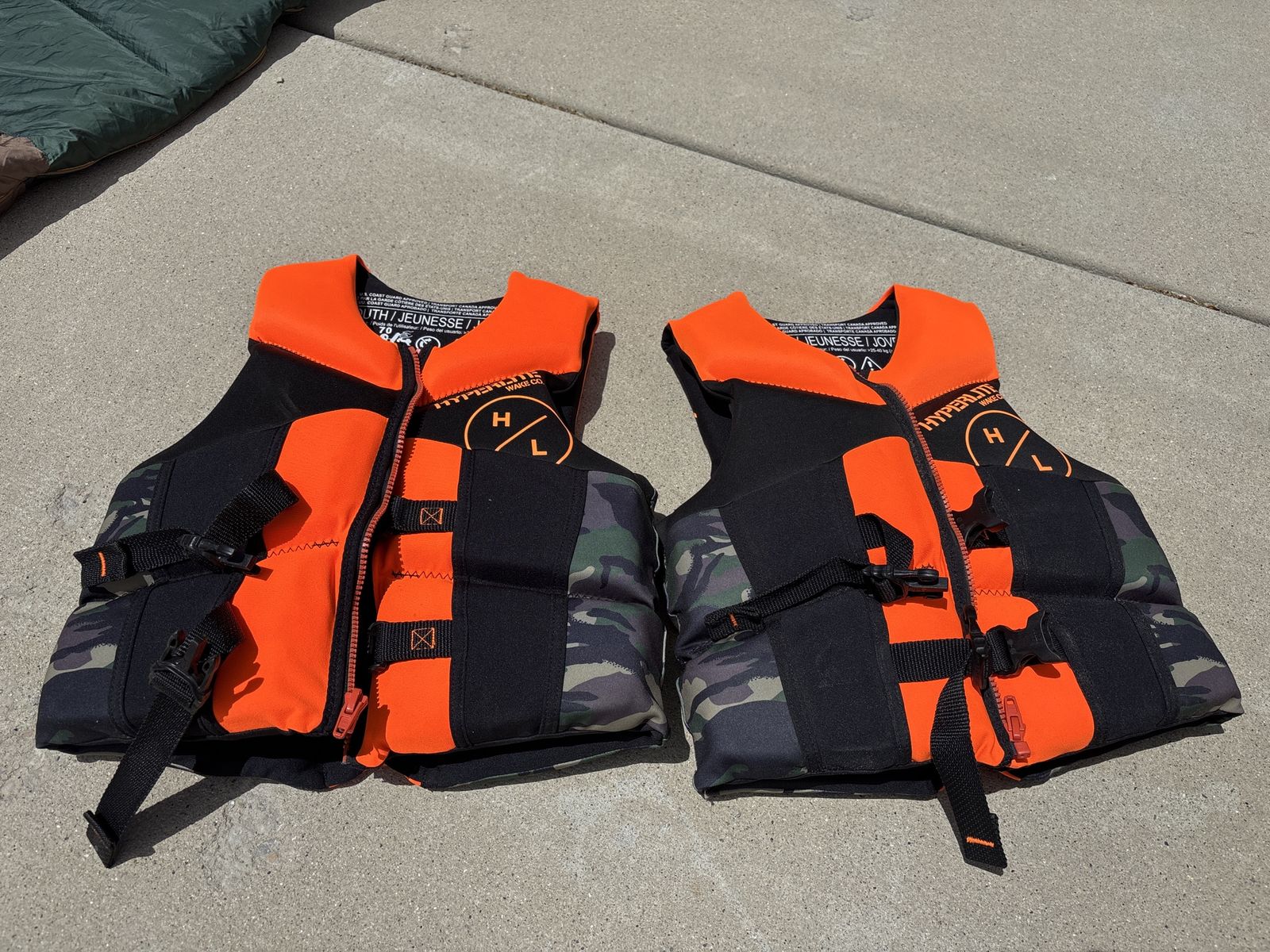 2 Hyperlite Youth Life Vests (70-90 lbs) - Orange Camo, US Coast Guard Approved