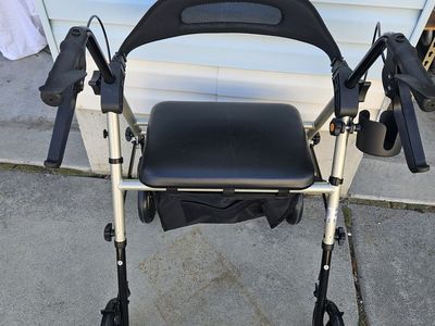 Foldable Rollator Walker seat that lifts for storage. (like New) 75 Dollars (Taylorsville)