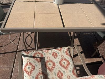 Tiled Table and cloth chairs