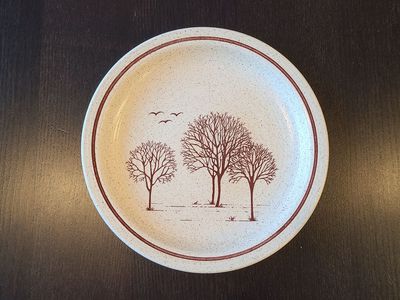 Decorative hand made clay plate
