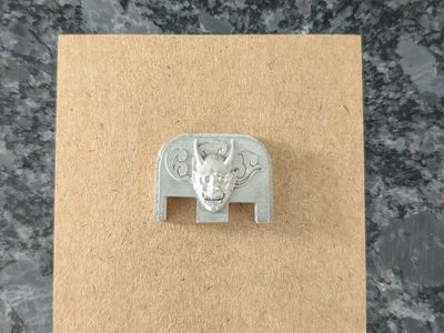 Silver Hannya Glock Gen 5 back plate by wicked grips