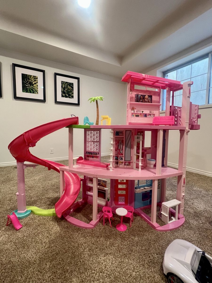 Barbie Dreamhouse Playset with Vehicles, Boat, Helicopter, and Car