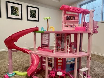 Barbie Dreamhouse Playset with Vehicles, Boat, Helicopter, and Car