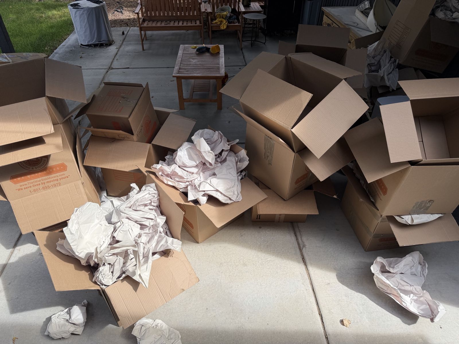 Assorted Used Cardboard Moving Boxes with Packing Paper