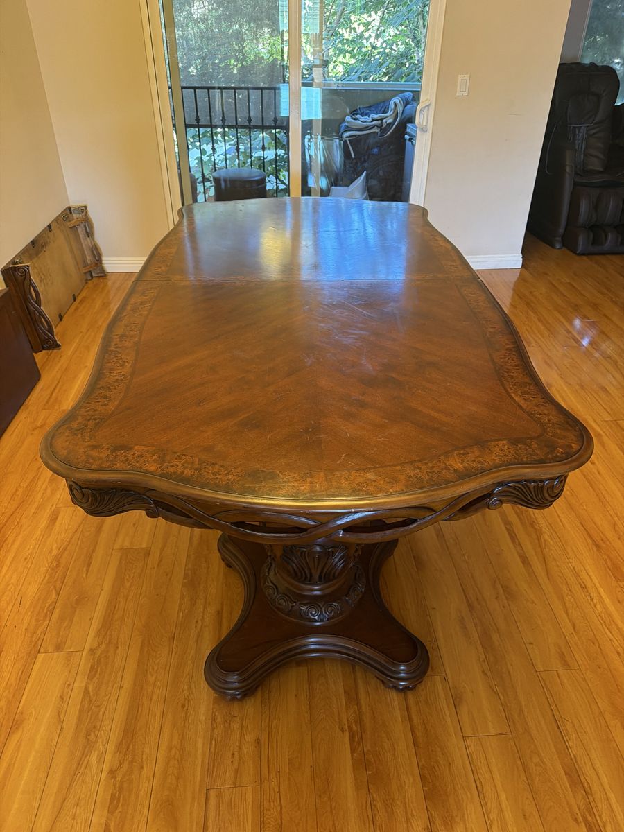 Large Wooden Dining Table with Detailed Carved Pedestal Base