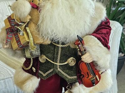 Kirkland Signature Decorative Santa Figure with Violin and Gifts 25"T