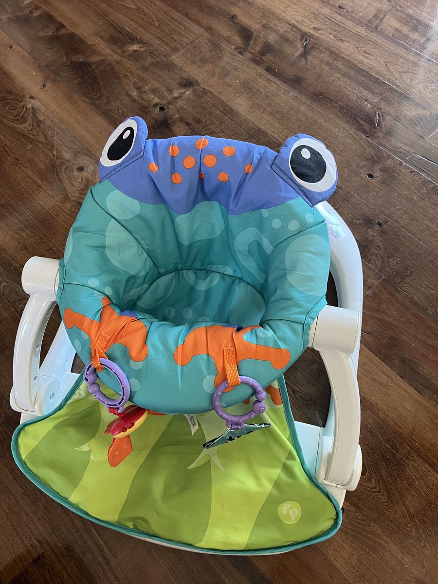 Fisher price sit me up floor seat with toys.