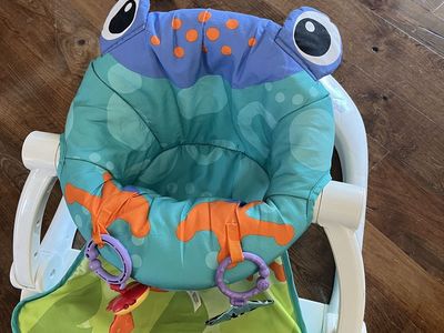 Fisher price sit me up floor seat with toys.