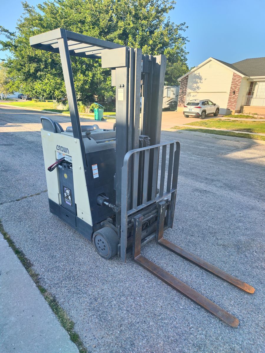 Crown Electric Stand-Up Forklift