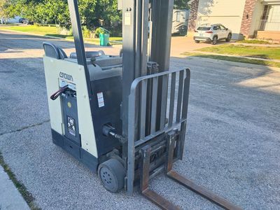 Crown Electric Stand-Up Forklift