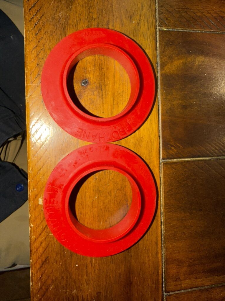 NEW - Rear Upper Coil Spring Isolators