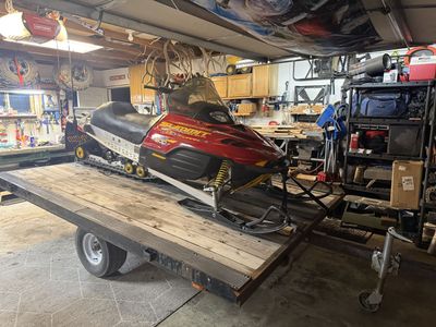 800 Ski-doo Summit and tilt deck trailer