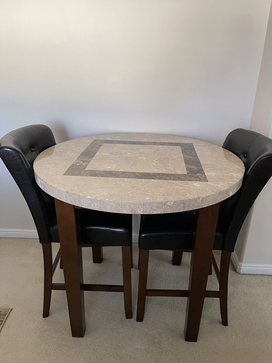 Mable Dining round table , only text message and cash