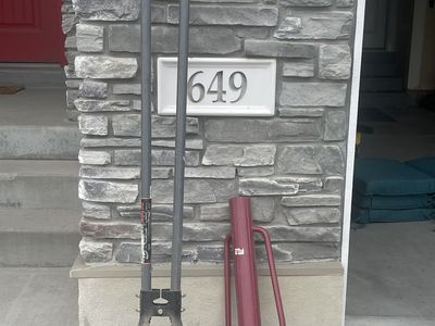 Post hole digger and metal fence post driver