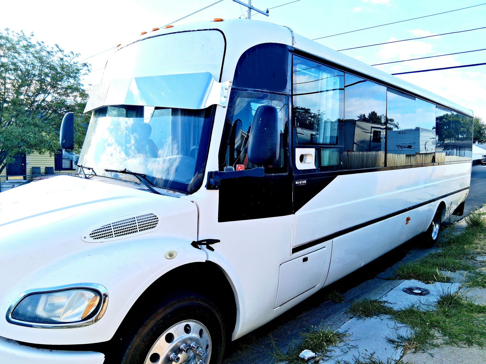 Freightliner motorhome m2     trade for rollback tow truck or diesel truck