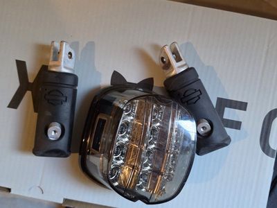 Oem headlight, tail light, mirrors and pegs for 2023 low rider s