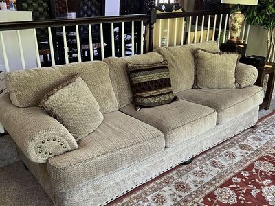Elegant Beige Upholstered Sofas with Nailhead Trim & Decorative Pillows - Used, Good Condition