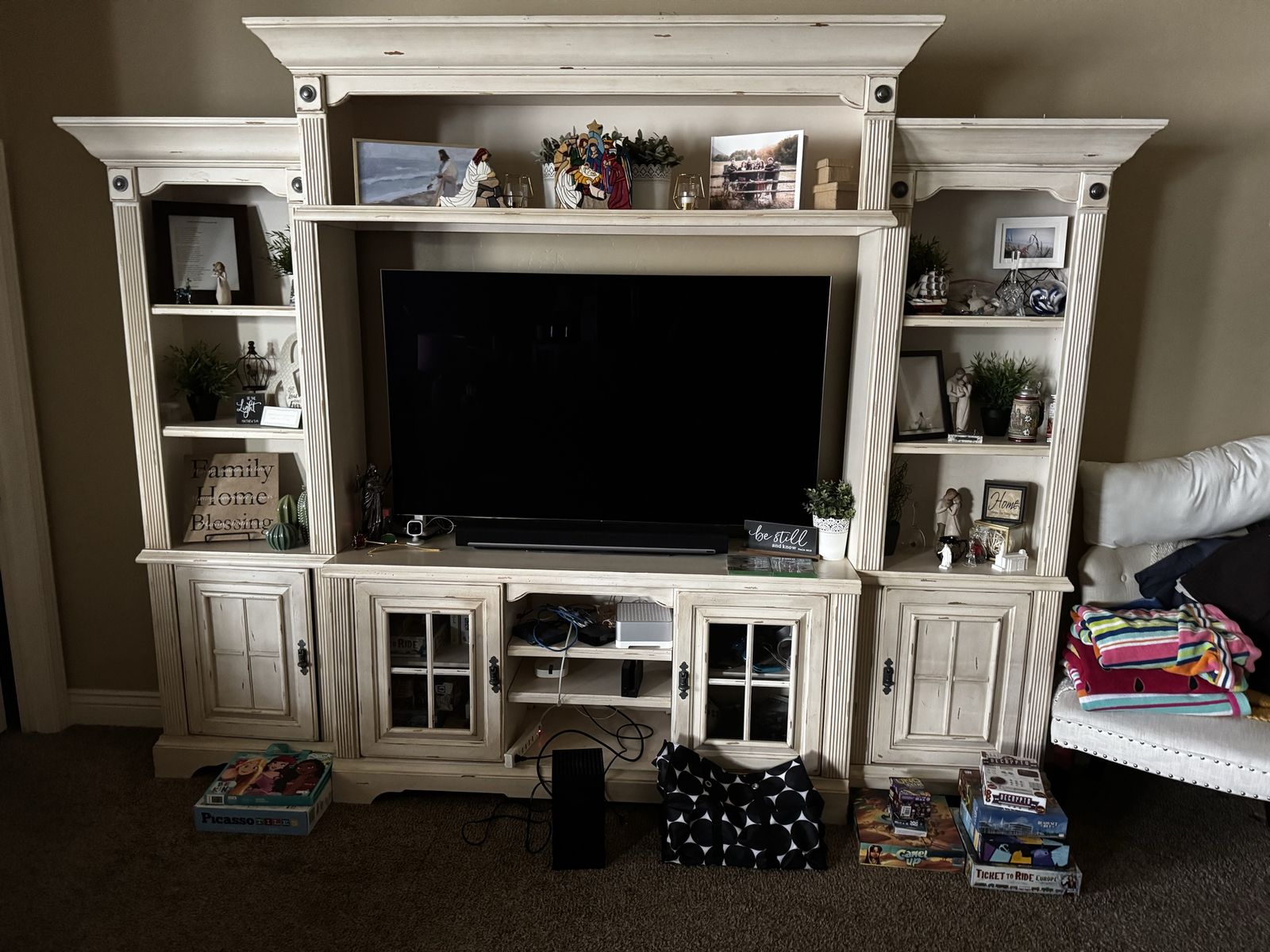 Large distressed white entertainment center