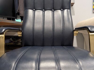 Adjustable height blue office chair