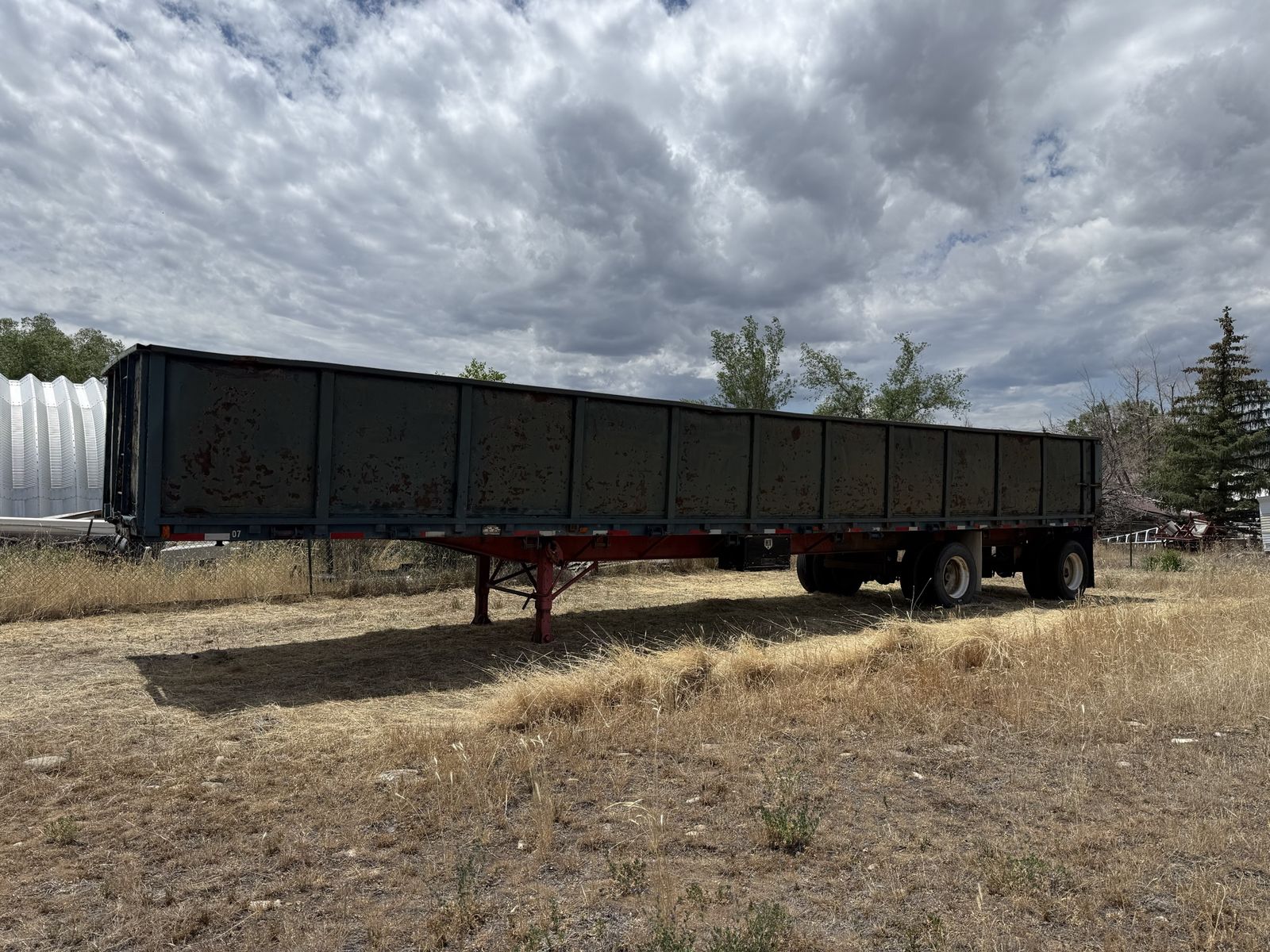 High side scrap metal trailer