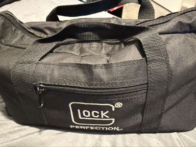Glock ammo/carry bag & 5 Glock mags