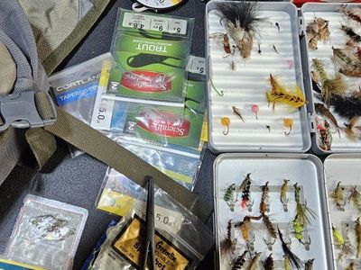Simms fly fishing case and a ton of Flies and extras.