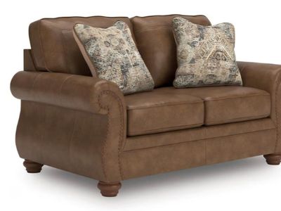 Signature Design by Ashley Shadsburne Rustic Faux Leather Loveseat with Nailhead Trim and 2 Throw Pillows, Brown