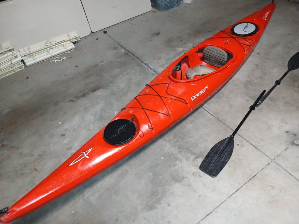 14 ft Dagger kayak with paddle
