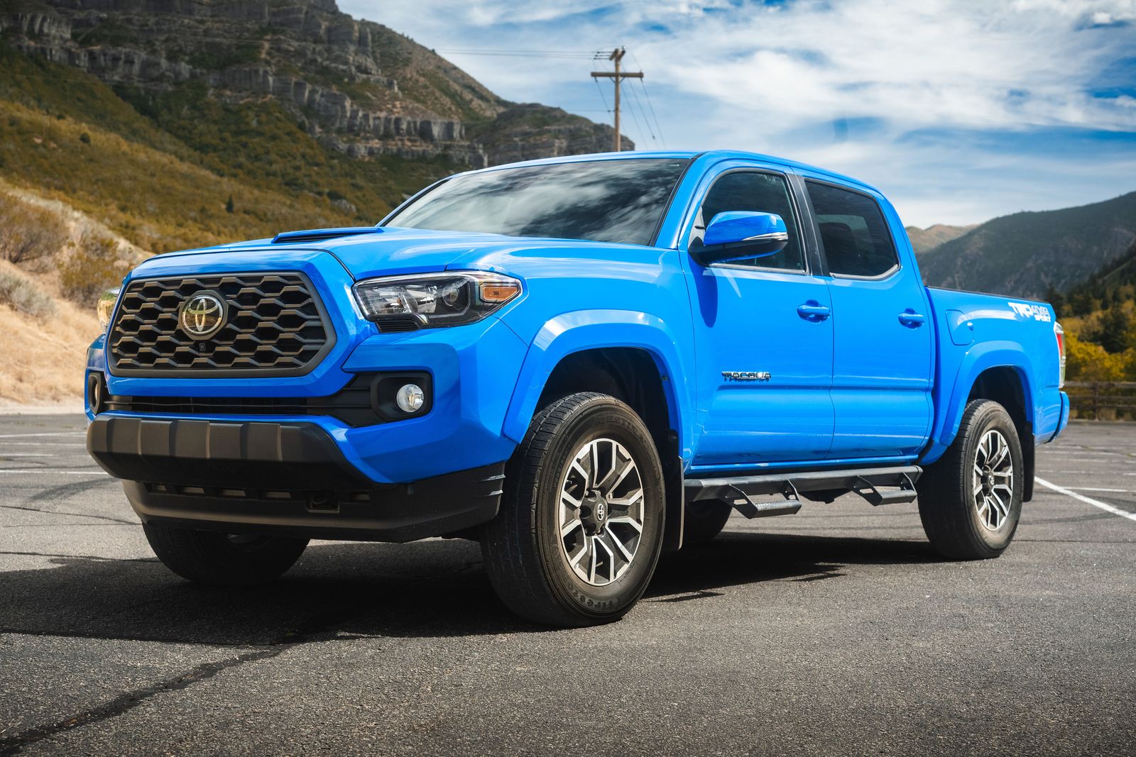 2020 Toyota Tacoma TRD Sport — rebuilt & branded title, 21% below market