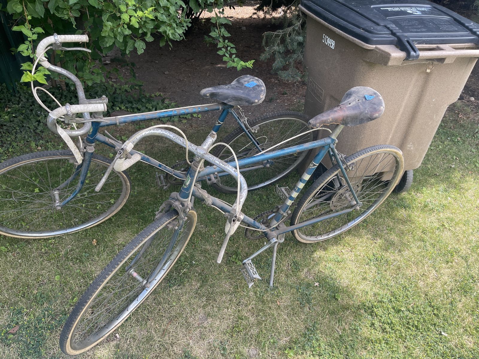 Vintage Peugeot road bicycles, likely from the 1970s.