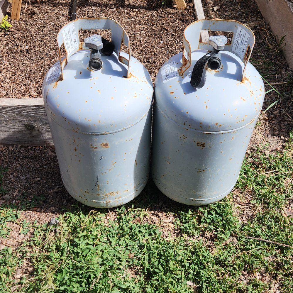 Pair of 7 gallon propane tanks