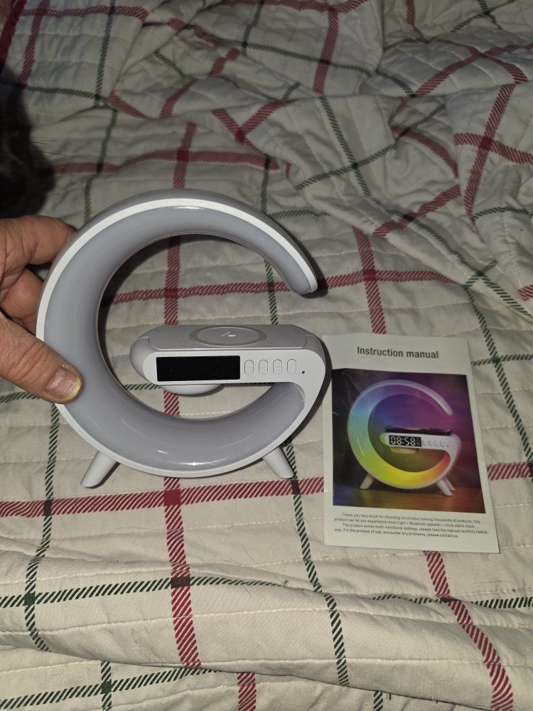iphone and other phones:  Multifunction Smart Speaker, 5W Wireless Charger, Bluetooth Speaker & Clock. 