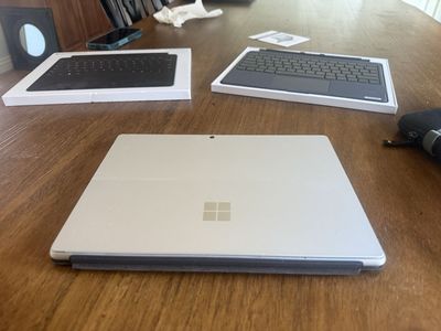 Microsoft Surface Pro Tablet with keyboard and accessories