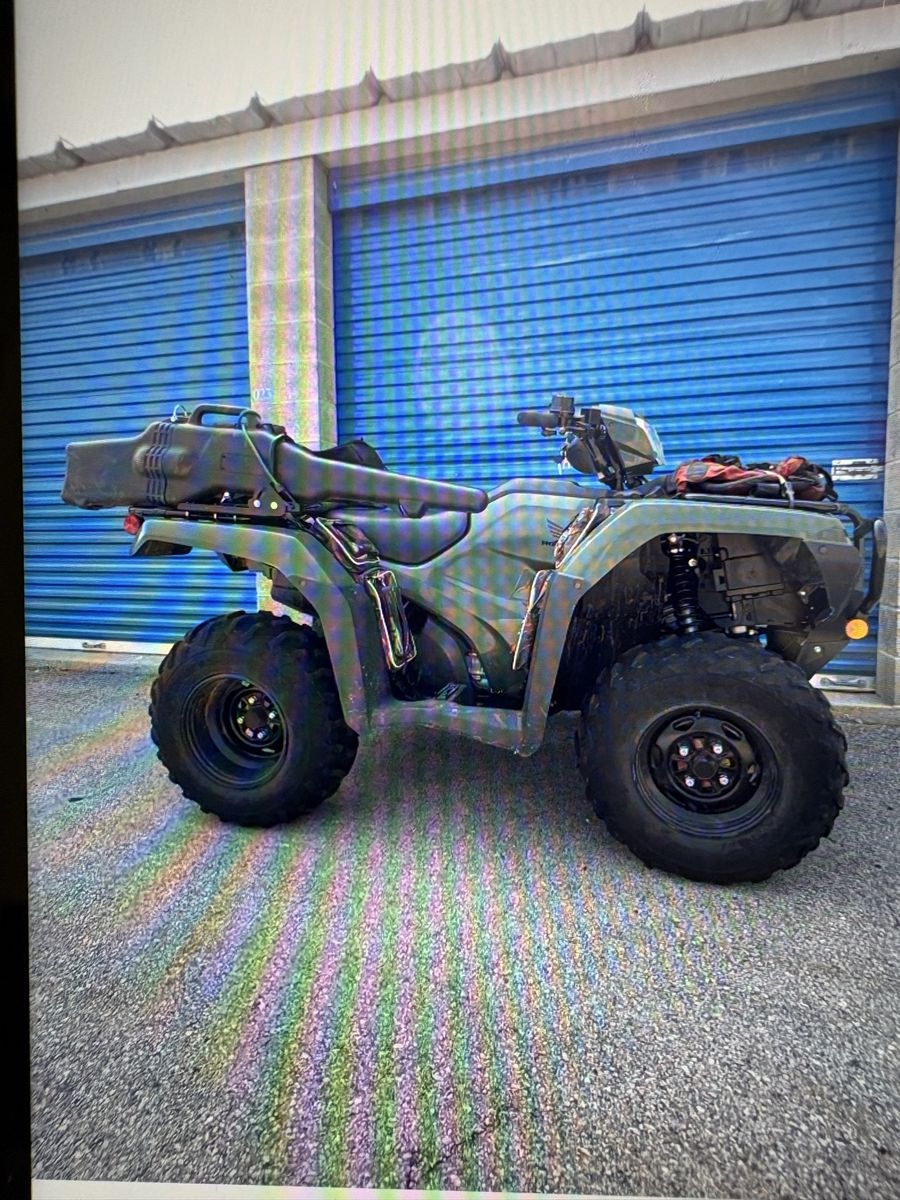 Honda ATV Four-Wheeler in Green with Rear Storage Box