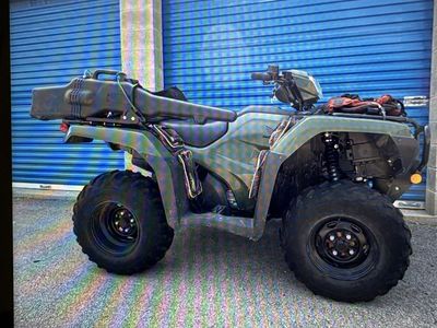 Honda ATV Four-Wheeler in Green with Rear Storage Box