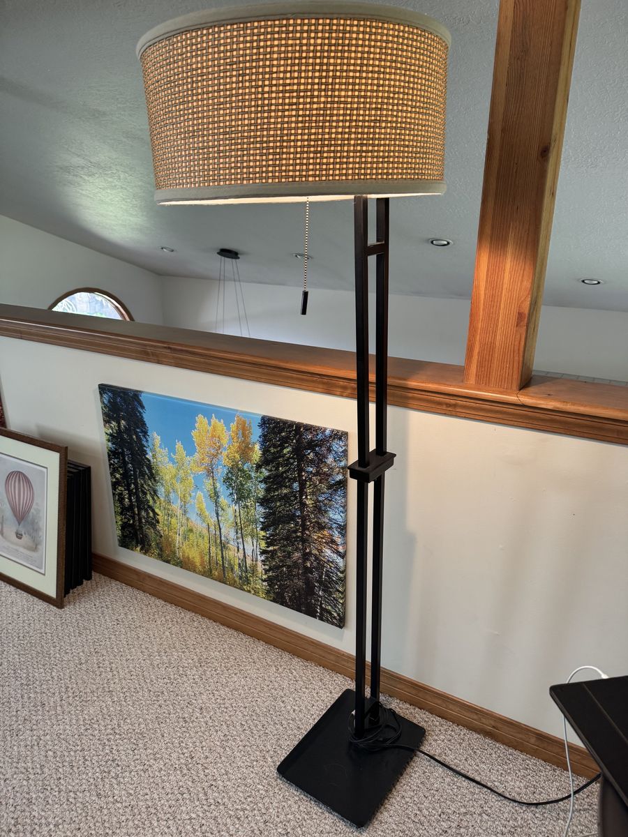 Rattan shade floor lamp