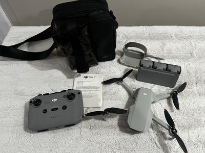 DJI Mini 2 Drone Fly More Combo with Controller, Charging Hub, and Bag
