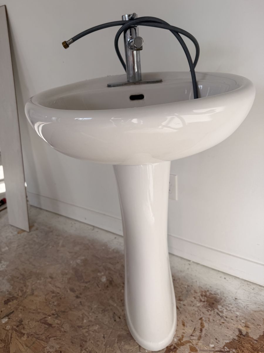 White Porcelain Pedestal Sink with Chrome Faucet