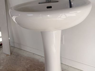 White Porcelain Pedestal Sink with Chrome Faucet